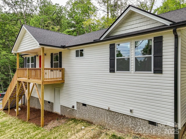 2506 Turnpike Rd, Horse Shoe, NC 28742 - view of side of property with crawl space, stairway, and roof with shingles