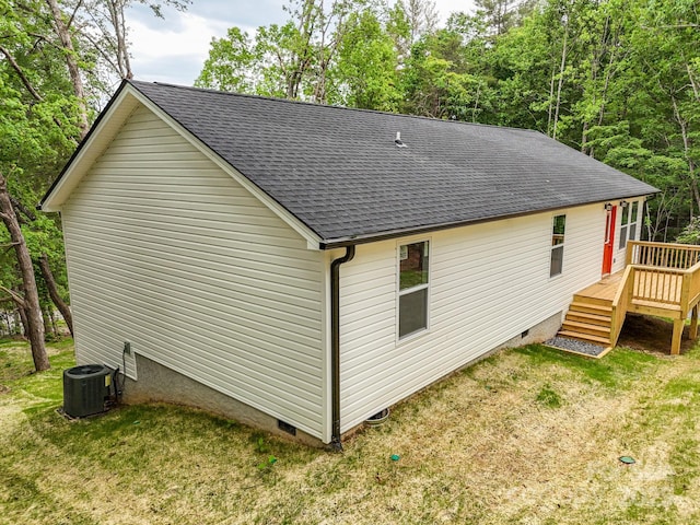 2506 Turnpike Rd, Horse Shoe, NC 28742 - view of home's exterior featuring crawl space, roof with shingles, a deck, central AC, and a yard