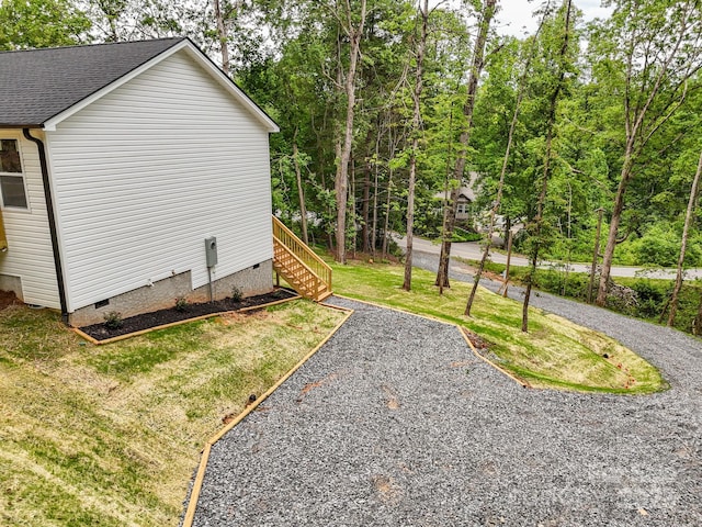 2506 Turnpike Rd, Horse Shoe, NC 28742 - view of home's exterior featuring crawl space, a lawn, and roof with shingles
