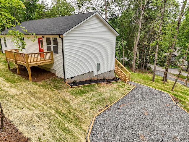 2506 Turnpike Rd, Horse Shoe, NC 28742 - view of property exterior featuring crawl space, a wooden deck, a lawn, roof with shingles, and stairway