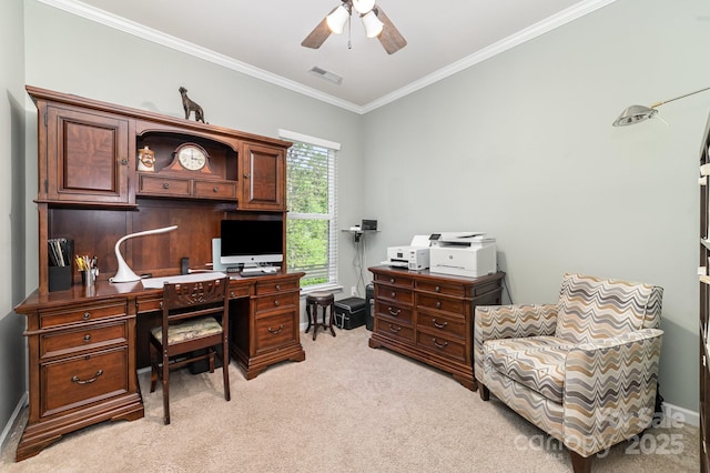 office area with crown molding, a ceiling fan, visible vents, light carpet, and baseboards