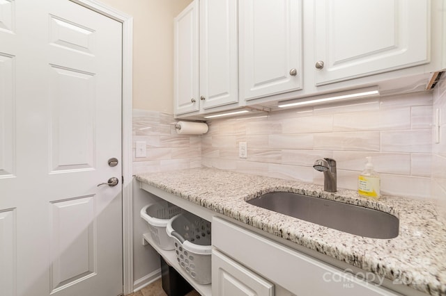 washroom featuring a sink