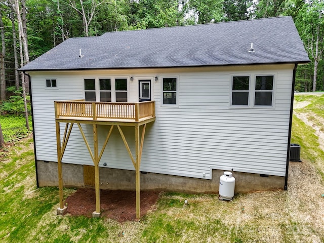 605 Knob Rd, Pisgah Forest, NC 28768 - rear view of house with crawl space, central AC unit, roof with shingles, and a deck