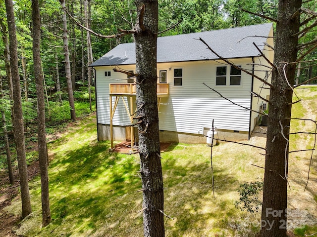 605 Knob Rd, Pisgah Forest, NC 28768 - view of property exterior featuring crawl space, roof with shingles, a yard, and a wooden deck