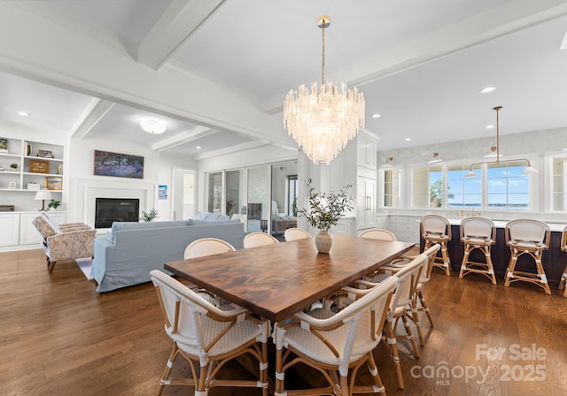 dining area with recessed lighting, beamed ceiling, a chandelier, a glass covered fireplace, and dark wood-style flooring