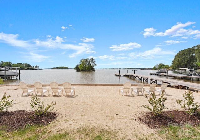 dock area with a water view