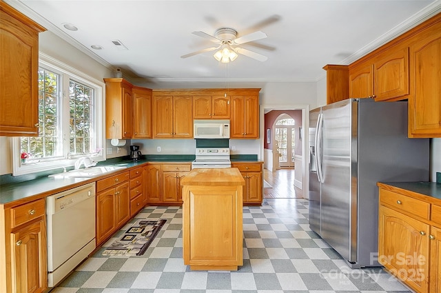 4633 River Bluff Ct, Charlotte, NC 28214 - kitchen with a healthy amount of sunlight, light floors, white appliances, a ceiling fan, and a sink