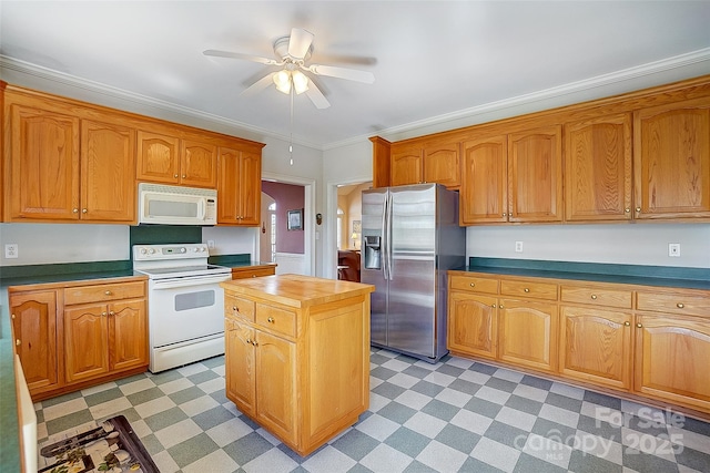 4633 River Bluff Ct, Charlotte, NC 28214 - kitchen with white appliances, a ceiling fan, light floors, ornamental molding, and wood counters
