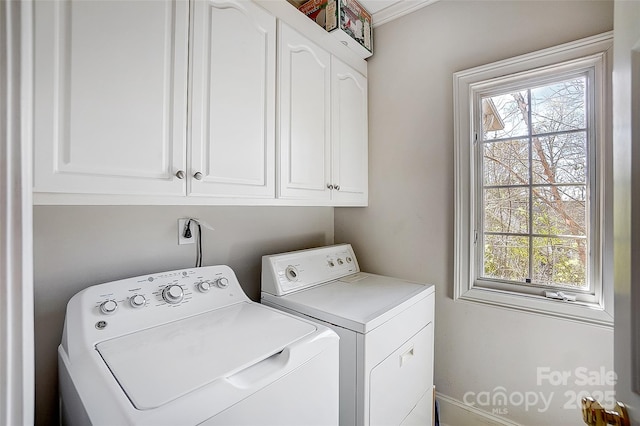 4633 River Bluff Ct, Charlotte, NC 28214 - laundry room featuring cabinet space and washer and dryer