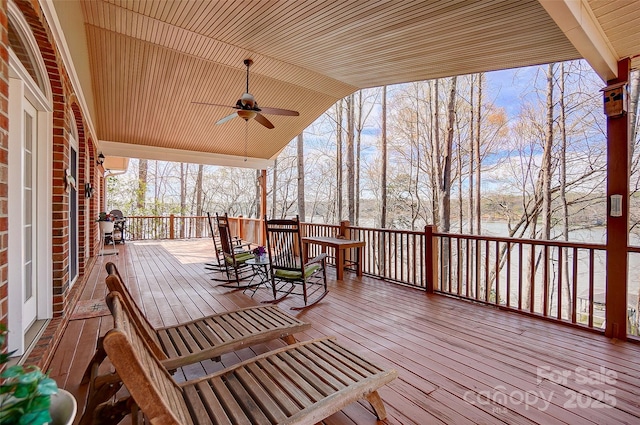4633 River Bluff Ct, Charlotte, NC 28214 - wooden terrace featuring a ceiling fan and a water view