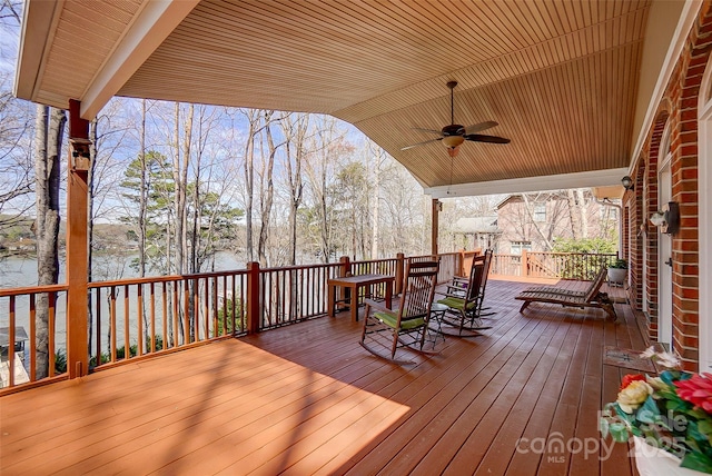 4633 River Bluff Ct, Charlotte, NC 28214 - wooden deck featuring a ceiling fan