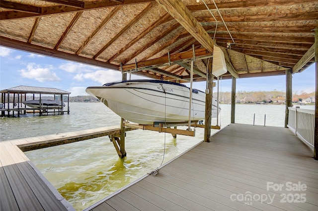 4633 River Bluff Ct, Charlotte, NC 28214 - view of dock with boat lift and a water view