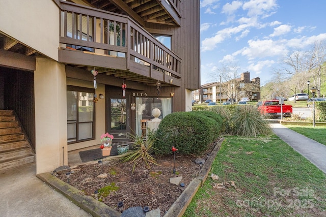 8175 Cedar Glen Dr, Charlotte, NC 28212 - view of exterior entry with a balcony