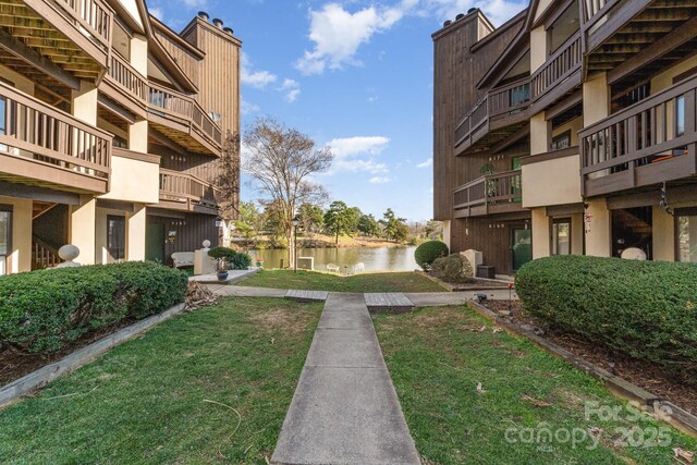 8175 Cedar Glen Dr, Charlotte, NC 28212 - view of community with a lawn and a water view