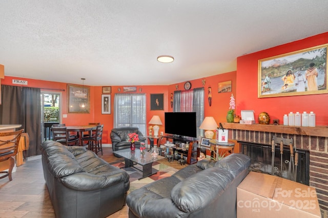8175 Cedar Glen Dr, Charlotte, NC 28212 - living area featuring visible vents, a textured ceiling, and a brick fireplace