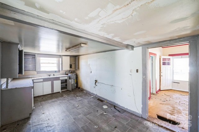 208 Columbia Ave, Rock Hill, SC 29730 - kitchen with a sink, light countertops, and electric water heater