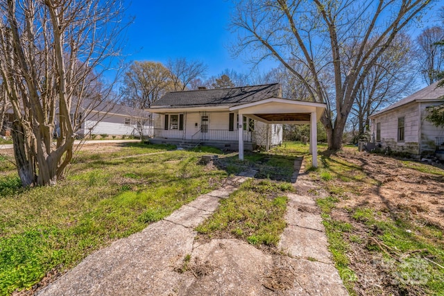 208 Columbia Ave, Rock Hill, SC 29730 - view of front facade featuring crawl space, a porch, and a chimney
