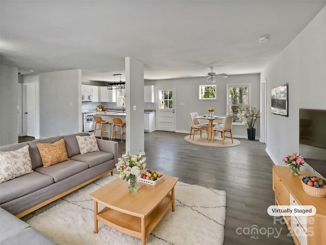 510 Newport Dr, Salisbury, NC 28144 - living area with baseboards, dark wood finished floors, and ceiling fan with notable chandelier