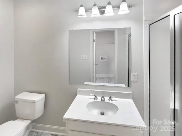 510 Newport Dr, Salisbury, NC 28144 - full bath with baseboards, toilet, a shower with shower door, marble finish floor, and vanity
