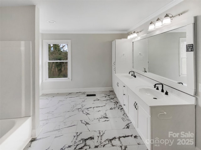 510 Newport Dr, Salisbury, NC 28144 - bathroom with ornamental molding, baseboards, marble finish floor, and a sink