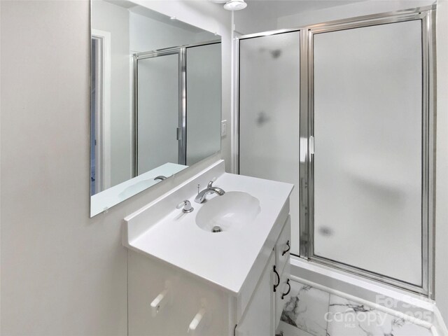 510 Newport Dr, Salisbury, NC 28144 - bathroom featuring marble finish floor, a stall shower, and vanity