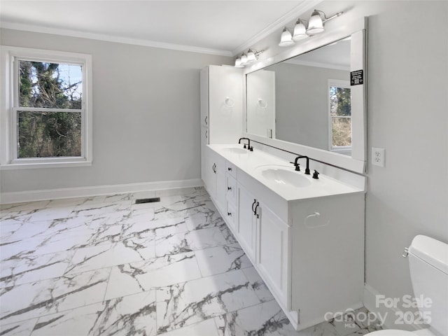 510 Newport Dr, Salisbury, NC 28144 - bathroom featuring a sink, baseboards, marble finish floor, and ornamental molding