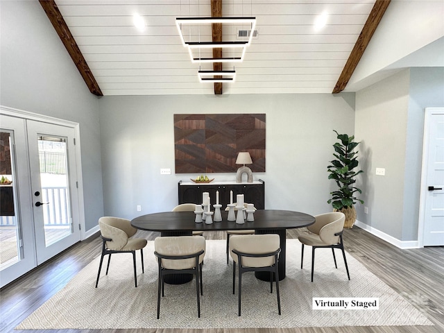 dining area with french doors, vaulted ceiling with beams, baseboards, and wood finished floors