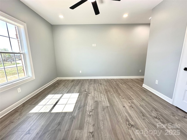 spare room with recessed lighting, baseboards, ceiling fan, and wood finished floors