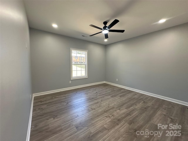 empty room with visible vents, ceiling fan, baseboards, recessed lighting, and dark wood-style flooring