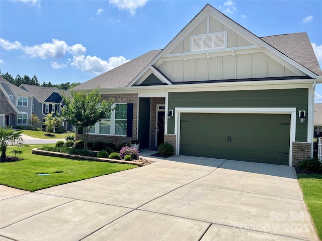 1638 Sweetmoss Loop, Denver, NC 28037 - craftsman house featuring board and batten siding, a front lawn, concrete driveway, brick siding, and a garage