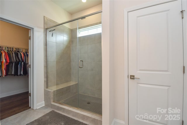1638 Sweetmoss Loop, Denver, NC 28037 - bathroom featuring a stall shower and a walk in closet