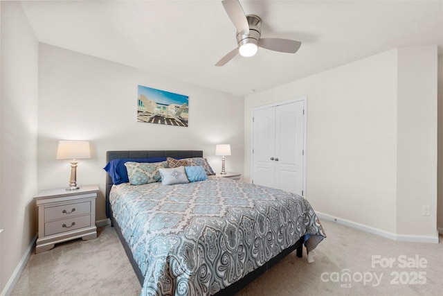 bedroom featuring baseboards, a closet, carpet floors, and ceiling fan