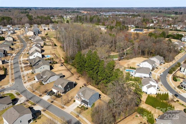 birds eye view of property with a residential view