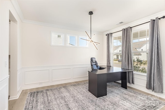 165 Winterberry St, Mooresville, NC 28117 - office space with light wood-type flooring, crown molding, a wainscoted wall, and a wealth of natural light