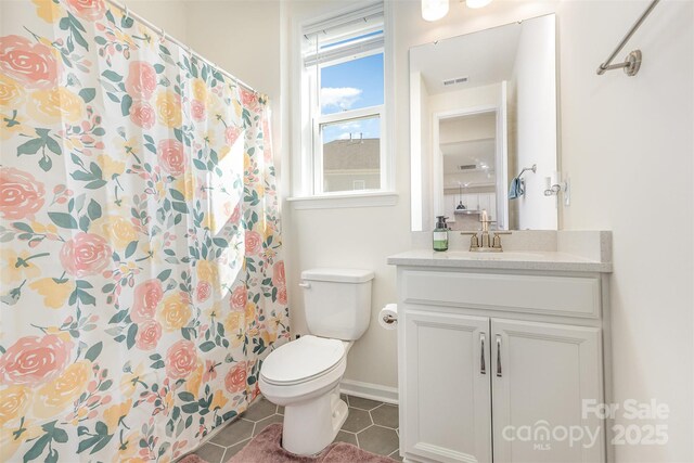 165 Winterberry St, Mooresville, NC 28117 - bathroom featuring vanity, baseboards, tile patterned floors, toilet, and visible vents