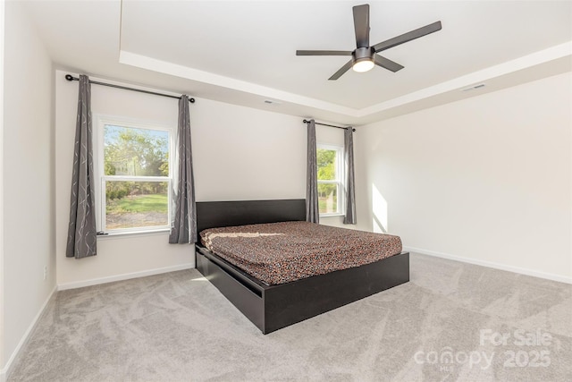 165 Winterberry St, Mooresville, NC 28117 - carpeted bedroom with visible vents, baseboards, a ceiling fan, and a raised ceiling