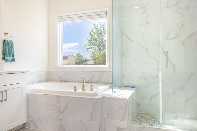 165 Winterberry St, Mooresville, NC 28117 - bathroom with a garden tub, a marble finish shower, and vanity