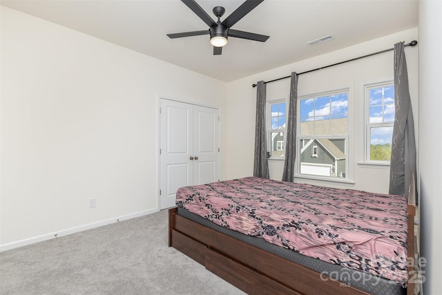 165 Winterberry St, Mooresville, NC 28117 - carpeted bedroom featuring a closet, ceiling fan, baseboards, and visible vents