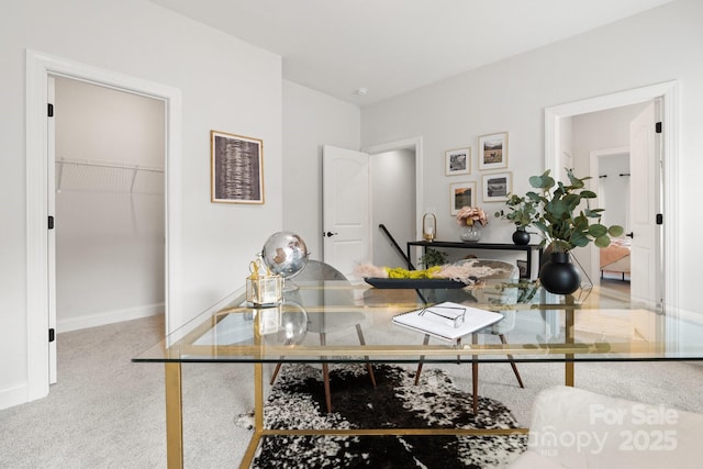 carpeted office with baseboards