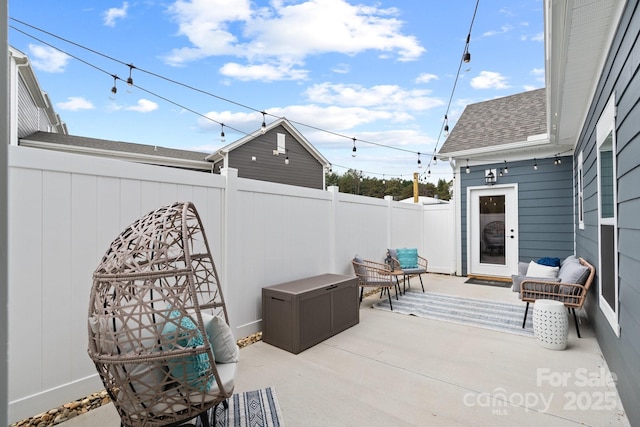 view of patio / terrace with fence