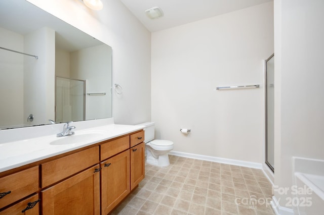 bathroom with toilet, a shower with door, a bathing tub, baseboards, and vanity