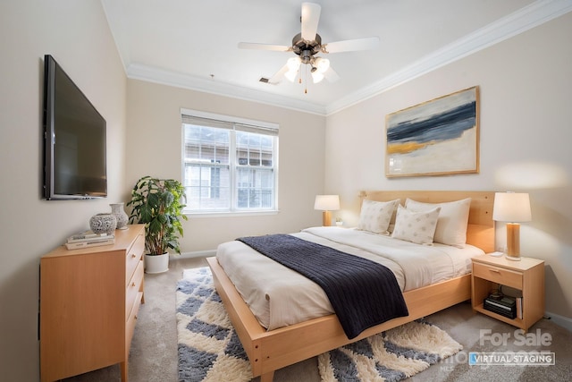 bedroom featuring light colored carpet, crown molding, and baseboards