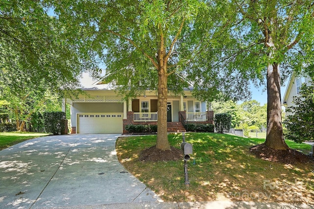 8008 Battersea Ct, Waxhaw, NC 28173 - obstructed view of property featuring a front lawn, brick siding, a garage, covered porch, and driveway