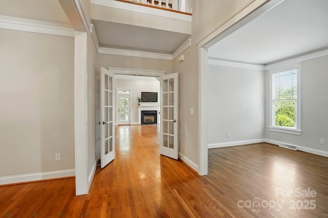 8008 Battersea Ct, Waxhaw, NC 28173 - foyer with french doors, ornamental molding, wood finished floors, and visible vents