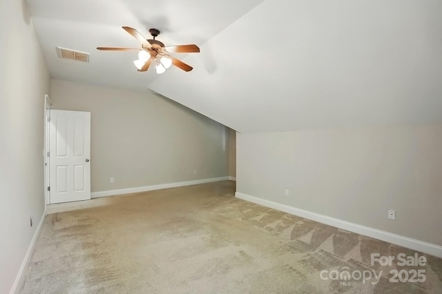 8008 Battersea Ct, Waxhaw, NC 28173 - bonus room featuring visible vents, baseboards, ceiling fan, carpet flooring, and vaulted ceiling