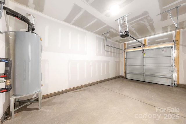 garage featuring a garage door opener and electric water heater