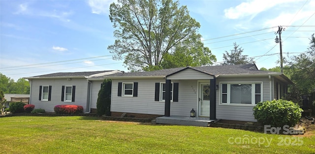 ranch-style home with a front lawn