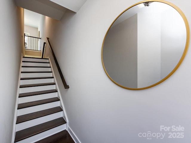 1814 Shumard Ln, Charlotte, NC 28205 - stairs featuring baseboards