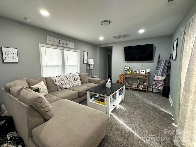 living room with recessed lighting, visible vents, baseboards, and carpet