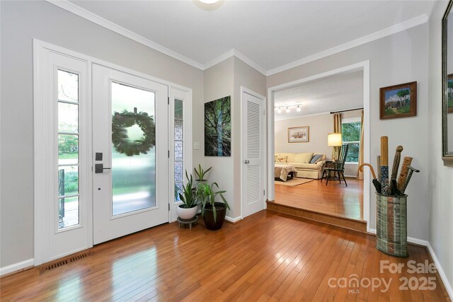 95 Ridgewood Pl, Brevard, NC 28712 - foyer with hardwood / wood-style floors, ornamental molding, and baseboards